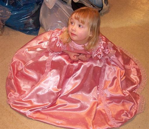 Flower girls dress from same satin as bridesmaids
